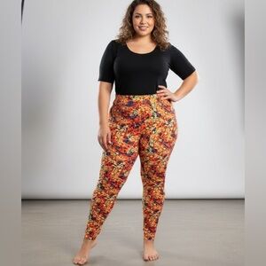 LuLaRoe orange & yellow leggings T&C fits size 12-18